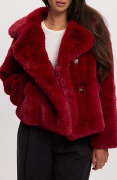 This plush faux fur cropped coat will keep you warm and stylish this season. Notched collar Long sleeves Double breasted button front Faux fur construction Shell: 100% polyester; fill: 100% recycled polyester; 00% polyester; fill content: 100% polyester cuff Hand wash cold, line dry Imported Model stats: 5'10", 32" bust, 25" waist, 36" hip. Model is wearing size S. Fitted Red Outerwear With Faux Fur Trim, Red Fur Coat With Faux Fur Trim For Winter, Red Faux Fur Coat, Cropped Faux Fur Coat, Red Fox Fur Coat, Red Faux Fur-lined Outerwear For Fall, Trendy Christmas Outfits, Cropped Coat, Notched Collar