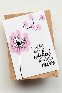 a card with the words i couldn't have pushed for a better mom on it