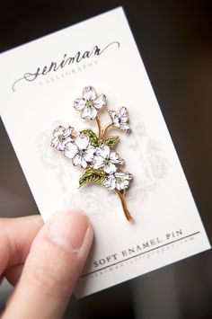 White Dogwoods Soft Enamel Pin by SenimanCalligraphy on Etsy https://www.etsy.com/listing/688831099/white-dogwoods-soft-enamel-pin Spring Gift Enamel Pin, Spring Flower Enamel Pin For Gift, Spring Flower Enamel Pin As A Gift, Spring Flower Enamel Pin Gift, White Flower-shaped Enamel Pin, Enamel Pin Collection, Jacket Pins, Bag Pins, Floral Pins