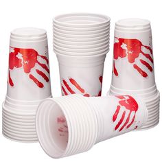 red and white cups with hand prints on them