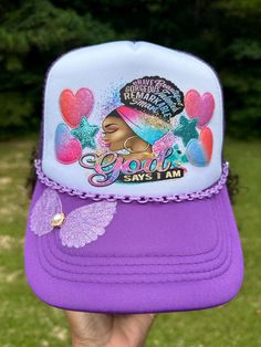 a person wearing a purple and white trucker hat with the words grow says i am on it