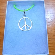 Handmade Peace Sign Necklace Made With Silver Peace Sign On Green Cord Chain. Pendant Peace Sign Measures 18mm In Antique Silver. The Peace Sign Is A Symbol Of Peace And Hope. Chain Is Adjustable With Claw Clasp Closure. Box Display Only. Pouch Included Free. New And Unused Item. Contact Me With Any Offers. Peace Sign Necklace, Symbol Of Peace, Sign Necklace, Box Display, Favorite Words, The Peace, Chain Pendant, Peace Sign, Womens Jewelry Necklace