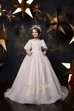 The Alina dress is perfect for your little girls formal event, birthday party, Red Carpet or pageant event. Floor length rich skirt, delicate ruffled sleeves and beautiful back details. Glistering wave pattern throughout the fabric design will make any little girl's heart flutter when she sees her new dress. The bodice is soft satin fabric covered with a layer of tulle. Matching headpiece is not included and optional. FEATURES: Fitted bodice with gorgeous oversized flutter sleeves An elegant ful Star Dresses, First Communion Dress, Dress Birthday, Pink Dresses, Birthday Party Dress, Dress Satin, Super Star, Dress Measurements, Girl Dresses