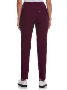 the back view of a woman in maroon pants