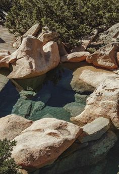 there is a small pool in the rocks