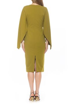 Trade in your LBD for a striking statement with this silhouette-skimming sheath dress that features a daring cowl neckline and cape sleeves. 44 1/2" (size X-Small) Back zip closure Cowl neck Cape sleeves 95% polyester, 5% spandex Machine wash cold, tumble dry low Imported Model stats: 5'10", 32" bust, 25" waist, 36" hip. Model is wearing size X-Small. Sheath Midi Cocktail Dress, Sheath Dress With Structured Shoulders, Bodycon Fit, Sheath Dress With Structured Shoulders In Bodycon Fit, Sheath Bodycon Dress With Structured Shoulders, Bodycon Sheath Dress With Structured Shoulders, Fall Cocktail Sheath Midi Dress, Cape Sleeves, How To Make Shoes, Cowl Neckline