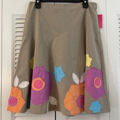 This Beautiful Sunny Leigh Floral Skirt Has Gorgeous Embroidery. Waist 16” Length 24” Side Zipper. 100% Cotton. Perfect For Year Round Wear. Spring Embroidered Beige Skirt, Spring Fitted Skirt With Patchwork, Spring Fitted Patchwork Skirt, Beige Patchwork Skirt For Spring, Spring Mini Skirt In Brown, Brown Mini Skirt For Spring, Fitted Brown Skirt For Spring, Brown Fitted Skirt For Spring, Spring Brown Patchwork Skirt