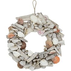 a wreath made out of driftwood and seashells