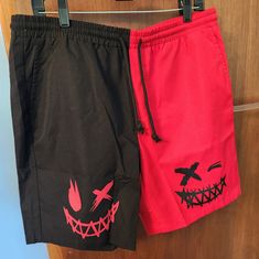 Red And Black Shorts With Faces On Them Casual Red Shorts, Red Shorts With Elastic Waistband For Streetwear, Red Elastic Waistband Shorts For Streetwear, Red Streetwear Bottoms With Built-in Shorts, Red Bottoms With Built-in Shorts For Streetwear, Red Short Bottoms For Streetwear, Red Streetwear Shorts, Red Short Length Bottoms For Streetwear, Red Shorts For Streetwear Summer