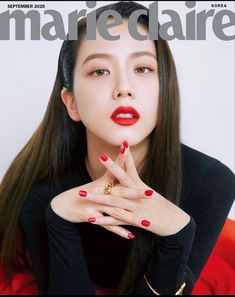 the cover of marie claire magazine with a woman's hand on her chest and red nails