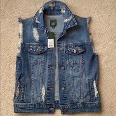 Distressed Sleeveless Denim Jacket. Nwt Never Worn. Spring Dark Wash Denim Vest With Frayed Hem, Trendy Medium Wash Vest Outerwear, Trendy Denim Vest Outerwear, Ripped Cotton Denim Jacket For Summer, Summer Medium Wash Vest Outerwear, Summer Ripped Cotton Denim Jacket, Casual Spring Denim Vest Jacket, Trendy Sleeveless Denim Outerwear, Casual Denim Vest For Fall