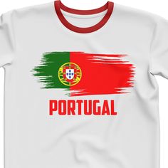 a white t - shirt with the flag of portugal painted on it's chest