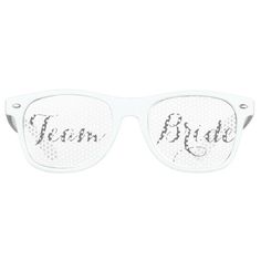 a pair of glasses with the words team bride written on them