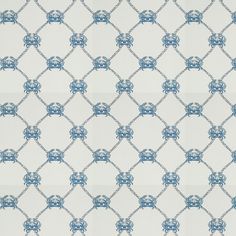 a white and blue wallpaper with an intricate design