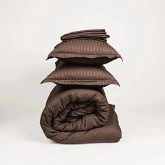 four pillows stacked on top of each other