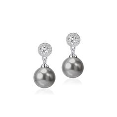 PRICES MAY VARY. Elegant Design: These dangle earrings feature lustrous pearls and sparkling cubic zirconia stones set in 925 sterling silver post for a timeless and sophisticated look. Quality Materials: Shell pearl, Brass with platinum plated,Crafted with genuine 925 sterling silver and high-quality cubic zirconia stones for lasting beauty and durability. Pearl Earrings Size:Length 2cm/0.78inch,10MM shell pearl,1MM cubic zirconia crystal. Quality Materials: Crafted with genuine 925 sterling si Dangle Pearl Earrings, Pearl Earrings Dangle, Brides And Bridesmaids, Pearl Drop Earrings, Pearl Drop, Sterling Earrings, Elegant Design, Silver Earrings, Cubic Zirconia