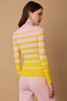 Our most popular basic fitted sweater but with stripes: the long sleeve turtleneck in our signature peachskin yarn, perfectly shaped with a built-in waist. Our signature peachskin classics are instant wardrobe staples. They stand out for their softness, simplicity, and comfort. Not only are they stretchy and perfectly form-fitting, but they also have slight compression properties that feel and look like shape wear. With their carved waist they won't bunch, web, or ride up. The dense and compact Spring Striped Stretch Sweater, Elegant Striped Sweater For Spring, Striped Fine Knit Sweater For Spring, Chic Striped Fitted Sweater, Chic Pink Turtleneck Sweater, Fitted Yellow Turtleneck Sweater, Fitted Fine Knit Turtleneck For Spring, Shape Wear, Basic Fits