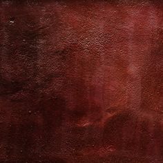 a red leather textured background or wallpaper that looks like it could be used as a backdrop