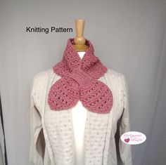 a knitted scarf on top of a mannequin headdress with the words knitting pattern written below it