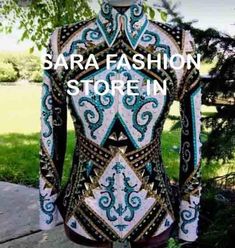 the back of a woman's bodysuit with an ornate pattern on it and words sara fashion store in