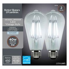 two light bulbs are shown in the package