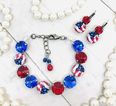 The sparkling patriotic Crystal Elements of sapphire blues and bright reds make up the perfect Bracelet and Earring pair to wear any time of the year. The faceted crystals are brilliant and very rich while showing the red, and blues of the Independence Flag. These jewelry pieces are sure to match many of your outfits. The earrings and bracelet are designed to be one size fits all.  12mm flag earrings are available.  Top quality European components are used in all jewelry pieces. This means the m Flag Earrings, Earrings Double, My Wish For You, Earrings Antique, Patriotic Flag, Brass Bracelet, Czech Crystal, Antique Earrings, Crystal Charm