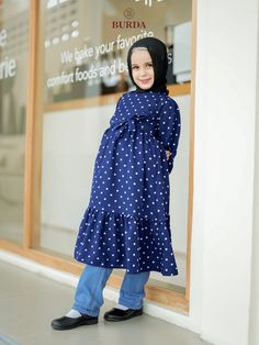 Dress your little one in style with our Kid's Navy Blue Polka Dot Dress! 🌟 This charming dress features a classic navy blue hue adorned with playful white polka dots, creating a timeless and cute look that is perfect for any occasion. The soft and comfortable fabric ensures all-day wearability, while the twirly skirt adds a fun and adorable touch. Let your child stand out in this sweet and versatile dress that will have them looking effortlessly chic wherever they go! 🌺 The Fabric: Shakila mat Polka Dot Long Sleeve Cotton Dress, Long Sleeve Polka Dot Cotton Dress, Cotton Knee-length Polka Dot Dress, Polka Dot Cotton Knee-length Dress, Knee-length Cotton Polka Dot Dress, Knee-length Polka Dot Cotton Dress, Navy Blue Polka Dot Dress, Navy Polka Dot Dress, Twirly Skirt