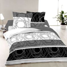 black and white comforter set with circles on it