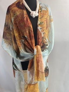 "Introducing the stunning THE SUN FLOWERS Kimono by Van Gogh. This one-of-a-kind blouse features a beautiful half sleeve design and showcases Van Gogh's iconic Sunflowers in a gorgeous artful print pattern. Measuring 38\" in length from shoulder to bottom and 34\" wide, this versatile rectangular wrap can be worn in multiple ways - as a shoulder wrap, head covering, or around your neck for a statement look. The high-quality fabric offers endless styling possibilities, making it the perfect addit Artistic Summer Kimono, Sunflower Half Sleeve, Half Sleeve Design, Sunflower Vans, Van Gogh Gifts, Half Sleeve Women, Cover Up Kimono, Van Gogh Sunflowers, Kimono Blouse