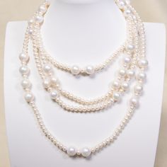 Our winter favorite necklace ever! 8-9mm round pearls combined with 3-4mm baby pearls are beaded into a French vintage style that matched so well with turtle neck or any other sweater or dress! It can be worn as 2-layer or 3 or 4 layers however you want. Pearl Type: Freshwater Pearls Pearl Quality: AA [Shape]: Round [Pearl Size]: 5-9mm [Blemish]: Minor [Luster]: High Necklace Length: 160cm Note: Every pearl is unique. Items may vary from the pictures. White Pearl Beaded Necklaces For Layering, Classic Pearl Necklace For Layering, Elegant Pearl Necklace For Layering With Round Beads, Elegant Pearl Necklace For Layering, Elegant White Beaded Necklaces For Layering, Multi-strand Pearl Necklace For Layering, French Lady, Baby Pearls, Freshwater Pearl Necklace