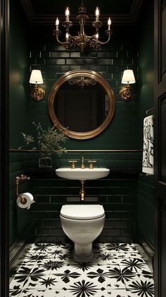 a bathroom with green walls, black and white tile flooring and gold trimming