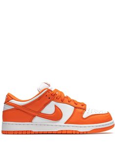 Supplied by a premier sneaker marketplace dealing with unworn, already sold out, in demand rarities. Each product is rigorously inspected by experienced experts guaranteeing authenticity. The Nike Dunk Low “Syracuse” is a special March 2020 release that draws inspiration from the beloved “Be True to Your School Pack” from 1985. The bold colorway mirrors the team uniform colors of the Syracuse Orange Men’s and Women’s basketball squads, and was worn on court by the teams in the mid-80s. The “Syracuse” Dunk released alongside a range of makeups for some of the top collegiate teams in the nation at the time. The modern version features buttery orange leather overlays that are contrasted by a white leather base that is visible on the mid-panel, toe, and heel. Orange Swooshes cover the mid-pane Nike Dunk Low Syracuse, 2022 Sneakers, Nike Dunk Low Sp, Dr Shoes, Orange Shoes, Cute Nike Shoes, Nike Brand, Cute Nikes, Aesthetic Shoes