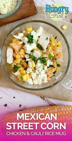 mexican street corn with chicken and cauliflower in a glass bowl on a table