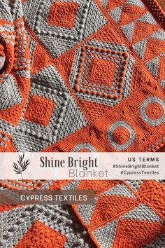 an orange and gray crocheted blanket on top of a wooden table with the words shine bright written across it