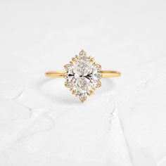 Product photo of 14k Yellow Gold 2ct. Oval-cut with Halo Diamond Threaded Engagement Ring featuring four triple-prongs|14k Yellow Gold Dainty Gold Band, Ring With Halo, Handcrafted Engagement Ring, Melanie Casey, Basket Setting, Engagement Ring Shapes, Oval Cut Diamond, Delicate Jewelry, Halo Engagement Ring