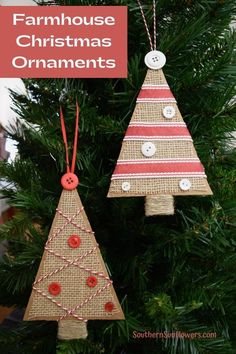 two christmas ornaments hanging from a tree with the words farmhouse christmas ornaments on them