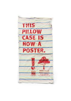 this pillow case is now a poster on the back of a white shirt that says,'this pillow case is now a poster '