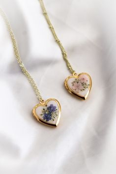 This Pendant Necklaces item by EmandLilyCo has 1845 favorites from Etsy shoppers. Ships from United States. Listed on 31 May, 2024 Wildflower Photo, Necklace Resin, Photo Locket Necklace, Floral Jewelry, Dope Jewelry, Dried Floral, Photo Locket, Funky Jewelry, Jewelry Lookbook