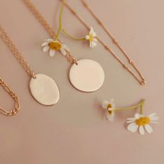 Featuring delicate bursts of floral beauty, our Blossom Posy Pendant is blooming with grace and elegance. Choose those Blossoms that represent the ones you love or simply your favourite combination of gorgeous flowers, and pick out the Posy that means the most. Simply choose up to four flowers/foliage for your oval Blossom Posy and let us design your beautiful bouquet. Like the look of a small pendant next to the Oval Posy? Add it here: Additional Small Pendant Crafted with love in our sunny Bri Mother's Day Rose Gold Oval Pendant Necklace, Minimalist Oval Rose Gold Necklace, Feminine Rose Gold Necklace For Everyday, Dainty Rose Gold Oval Necklace, Dainty Oval Rose Gold Necklace, Rectangle Necklace, Girlie Girl, May Birthday, Personalised Jewellery