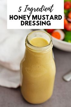 a mason jar filled with honey mustard dressing