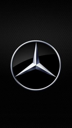 the mercedes logo on a black background