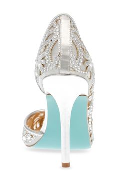 Sparkling crystals create an ornate pattern on a half d'Orsay pump that completes your look with undeniable glamour. 4" heel Textile upper/synthetic lining and sole Imported Crystal High Heel Shoes For Formal Occasions, Crystal High Heels For Formal Occasions, Crystal Closed Toe Heels For Evening, Crystal Closed Toe Evening Heels, Crystal High Heels For Evening, Crystal High Heel Wedding Shoes For Evening, Elegant High Heel Crystal Wedding Shoes, Elegant Crystal High Heel Wedding Shoes, Crystal Pointed Toe Heels For Evening