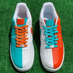 Hand painted Orange/Turquoise Split pattern on authentic white Air Force 1s. Painted with water resistant and non cracking leather paint. Laces are included. Sizing Details Choose size carefully, Air Force 1's run big so we recommend you get a half size smaller than your usual size. White Custom Leather Sneakers With Waterproof Paint, White Leather Custom Sneakers With Waterproof Paint, Blue Hand Painted Leather Custom Sneakers, Blue Leather Custom Hand Painted Sneakers, White Air Force 1s, Lv Sneakers, Custom Jordans, Air Force Shoes, White Air Forces