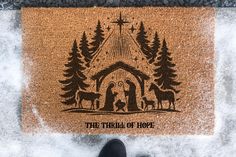 someone standing in front of a door mat with the words, the temple of hope