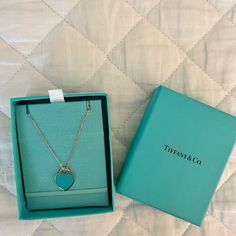 This Necklace Is Brand New From The Tiffany Blue Line And Never Been Worn. It Is Sterling Silver With The Traditional Tiffany Blue In The Heart. It Is In The Original Box That In Which It Was Purchased. Tiffany E Co Necklace, Elegant Blue Necklaces For Valentine's Day, Blue Luxury Necklace For Valentine's Day, Luxury Blue Heart-shaped Necklace, Elegant Blue Heart Necklace, Blue Heart-shaped Necklace For Formal Occasions, Elegant Blue Heart Necklace For Valentine's Day, Elegant Turquoise Necklace With Heart Charm, Elegant Blue Necklace With Heart Charm