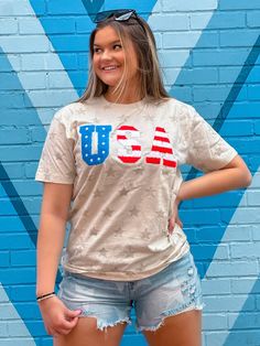 Stay festive and show off your star-spangled style with this USA Chenille Cream Star T-Shirt! It's the perfect top for any Fourth of July occasion. Stars and stripes in red, white, and blue with the chenille fabric make it truly patriotic and SUPER stylish! Boom! 💥 Unisex sizing and fit SPECIAL CARE - WASHING INSTRUCTIONS: Hand washing and air drying are always best for these items. Wash on delicate, cold, and inside out. Always air dry to prevent lint from sticking to the letters and for longe Star T Shirt, Star Spangled, Chenille Fabric, Stars And Stripes, Red White And Blue, Washing Instructions, Hand Washing, Fourth Of July, Air Dry