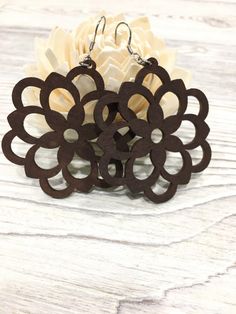 Check out this item in my Etsy shop https://www.etsy.com/listing/922304493/wood-earrings-for-woman-wooden-earrings Elegant Brown Flower Earrings For Pierced Ears, Brown Dangle Flower Earrings For Pierced Ears, Elegant Brown Drop Flower Earrings, Brown Flower Drop Earrings, Brown Wooden Earrings As Gift, Flower Power Wood Earrings, Cricut Wood Engraved Earrings, Laser Engraved Earrings, Artisan Brown Wooden Earrings