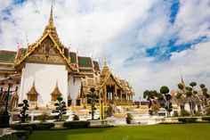 an elaborately decorated building in the middle of a park