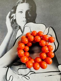 1960s Glass Orange Beaded Coil Bracelet. This fun bracelet fits any size wrist and is comfortable to wear. It has three to two rows of beads depending on the size of you wrist. Notice in the pictures on me the front has two rows and the sides and back have three rows. It has a dangle orange bead on each end.It is 1 1/2" in width three rows and 7/8" in with with two rows. Beautiful and bright Pop Art Era Bracelet. It is in great vintage condition. Free Shipping in the U.S> when Purchasing $35 or Retro Orange Jewelry For Party, Orange Bangle Jewelry With Colorful Beads, 60s Bracelets, 70s Bracelets Vintage, Luxury Vintage Orange Beads, 70s Jewelry, Art Eras, Coil Bracelet, Fun Bracelet