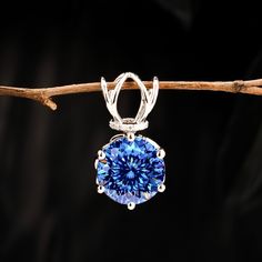 Portuguese Cut moissanite Diamond Pendant , 10K/14K/18K/ Solid Gold Portuguese Cut Moissanite Pendant For Women Gift, Cyan Blue Portuguese  ✥ 𝐌𝐚𝐢𝐧 𝐒𝐭𝐨𝐧𝐞 𝐃𝐞𝐭𝐚𝐢𝐥𝐬 ↣ Shape And Cut :- Round Portuguese Cut ↣ Type: Moissanite Diamond  ↣ Weight: 5.50  CT ↣ Dimension:  11.00 MM  (App.) ↣ Color: Sapphire Blue  ↣ Clarity: VVS ↣ Making Process: Handmade - Crafted Thank You Sapphire Moissanite Jewelry With Prong Setting, Sapphire Tanzanite Jewelry With Prong Setting, Dazzling Blue Moissanite Jewelry, Round Cut Tanzanite Diamond Jewelry, Round Cut Diamond Treated Tanzanite Jewelry, Blue Moissanite Jewelry With Brilliant Cut, Blue Brilliant Cut Moissanite Jewelry, Blue Tanzanite Jewelry With Prong Setting, Blue Brilliant Cut Round Pendant Jewelry